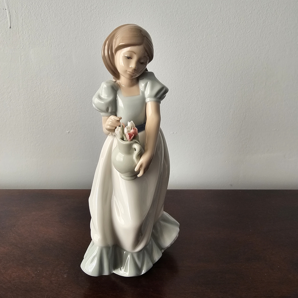Elegant Porcelain Sculpture with Soft Hues